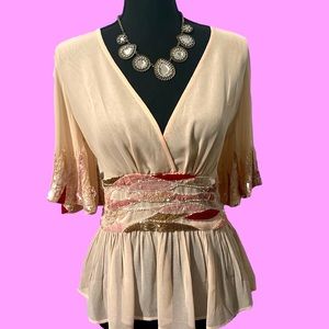 Sequin and beaded peplum top